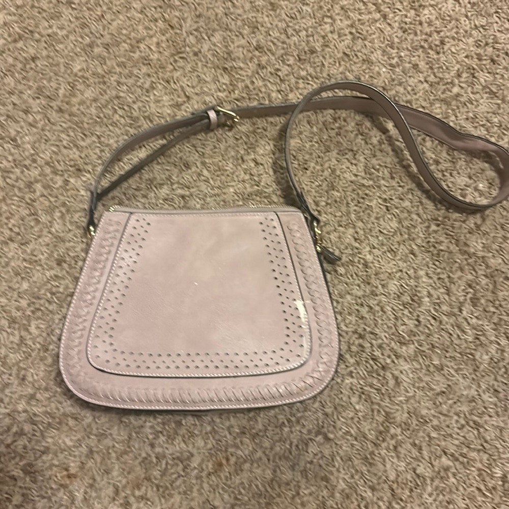 Good purse just lil paint on the front it an Italian brand and made in Italy